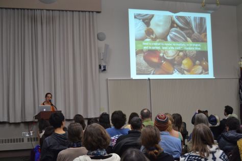 Oona Coy presenting a talk on seed saving
